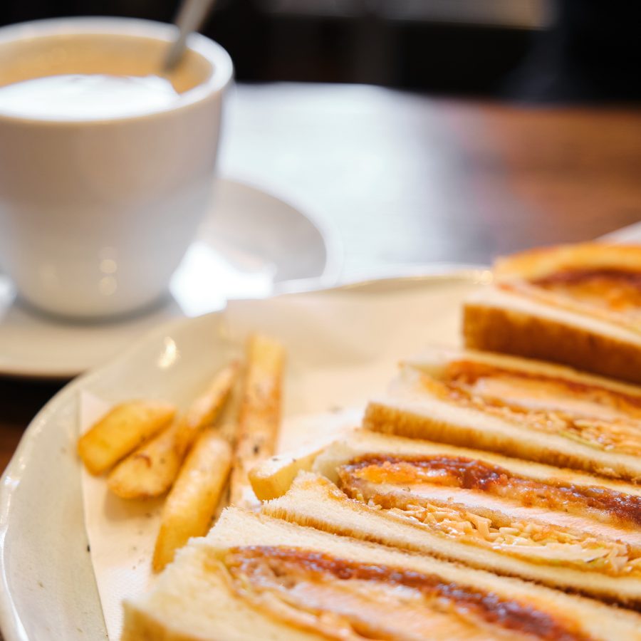 A Japanese style sandwich comprising of toasted bread and various fillings is accompanied by fries and a cup of coffee. Nagoya’s unique version of this sandwich is ogura toast (which has a red bean topping), available at Konparu. 
