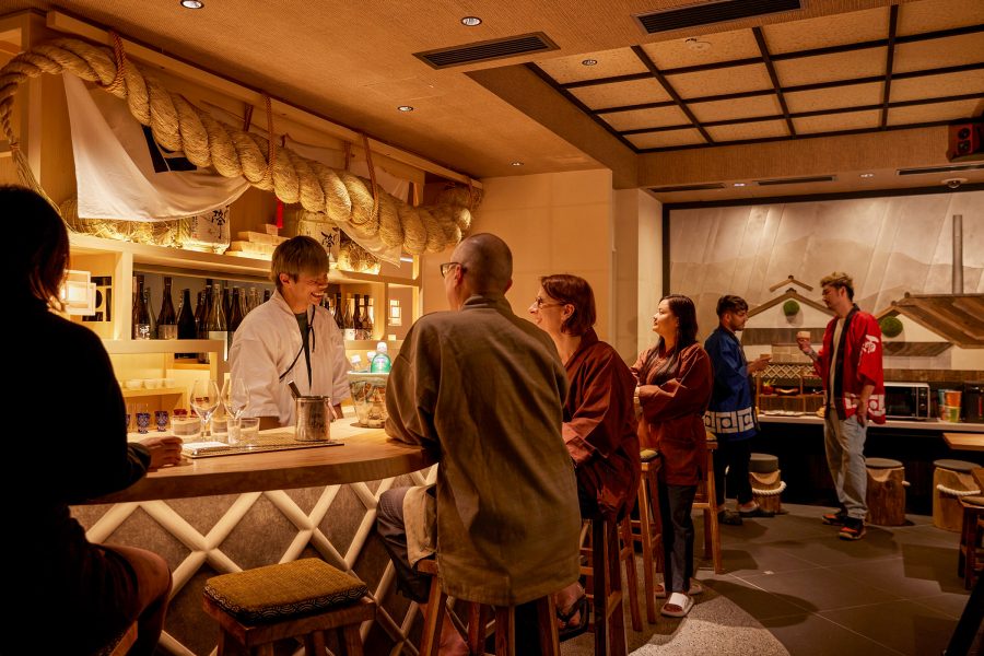 View of the bar at the Sake Bar Hotel Tokyo with traditional details.