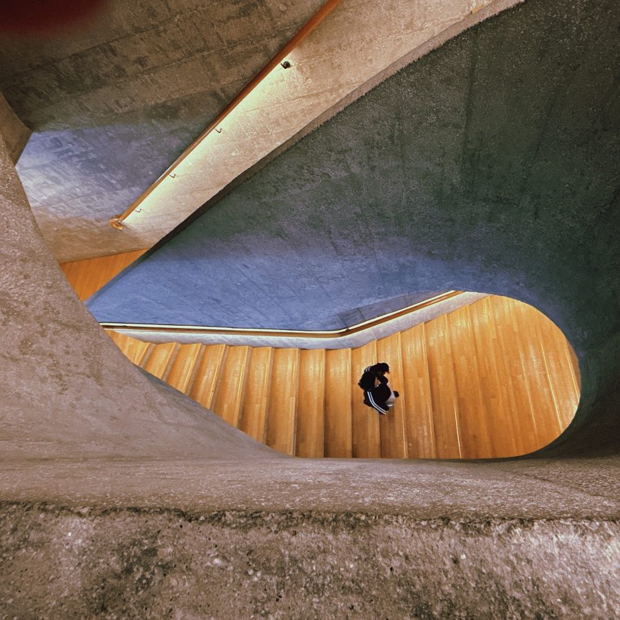 Person walking up the stairs at JC Contemporary.  