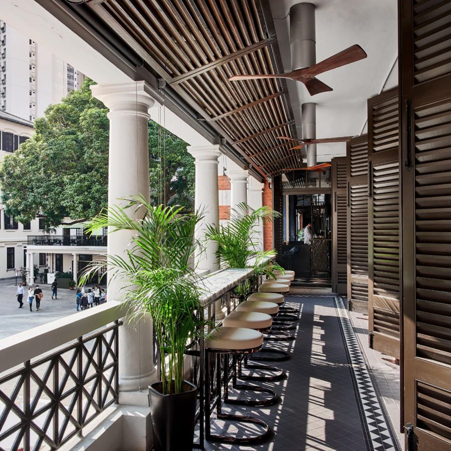 hot of The Dispensary’s outdoor terrace with light streaming onto it in Hong Kong.