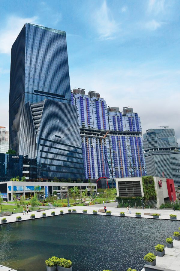 A view of the buildings surrounding Kai Tak Sports Park and Kai Tak MTR station in Hong Kong.