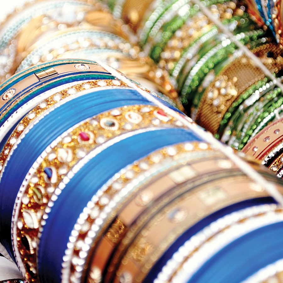 People browse colourful souvenirs on displays at a shop on Hefang Street.