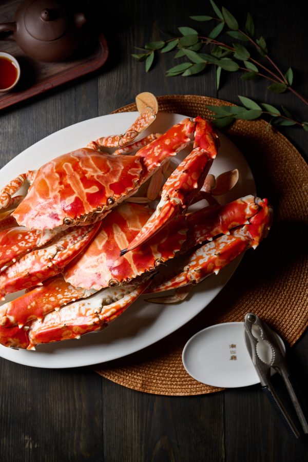 A plate with two whole steamed crabs served at Chiu Bistro, Hong Kong. 