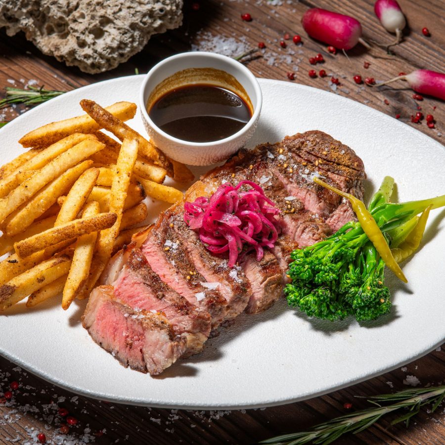 A steak with fries and vegetables at Pier 7 Café and Bar, Hong Kong. 