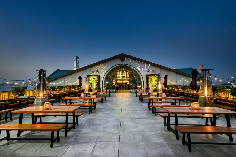 The terrace of Pier 7 Café and Bar, Hong Kong, at dusk. 