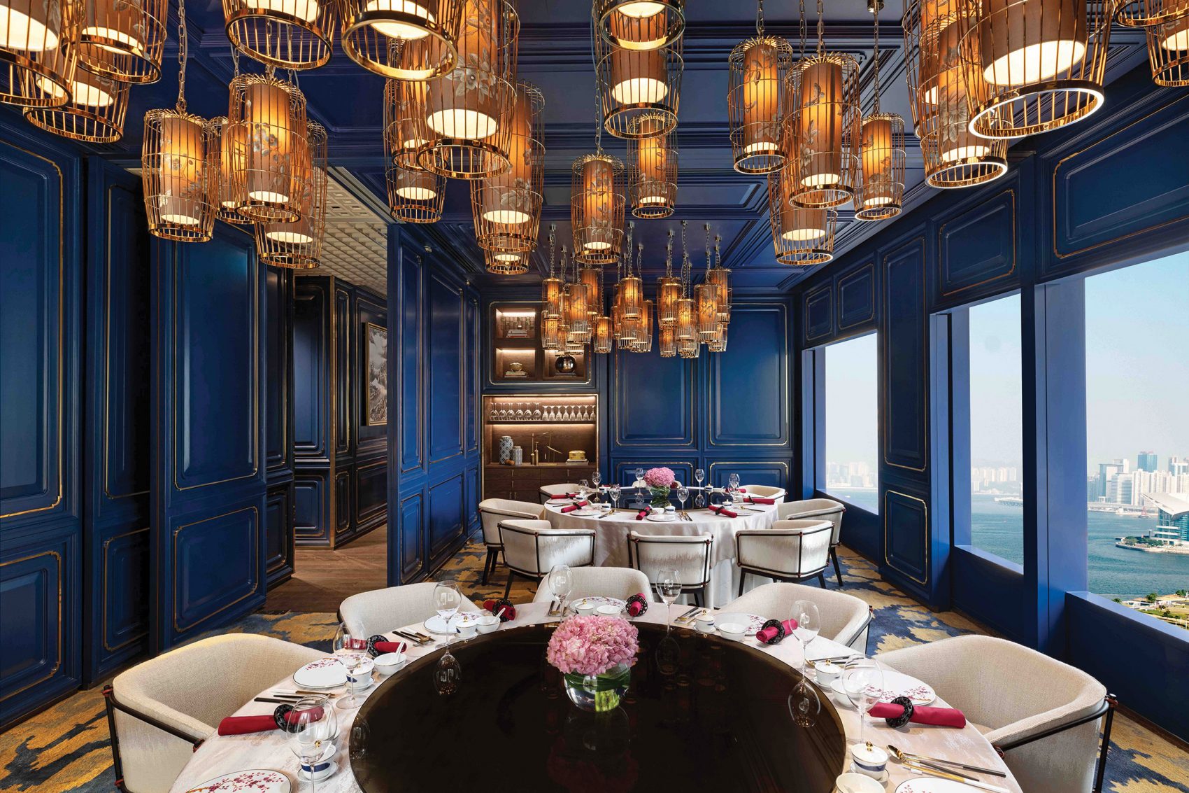 A view of a blue dining room at the Mandarin Oriental Hong Kong