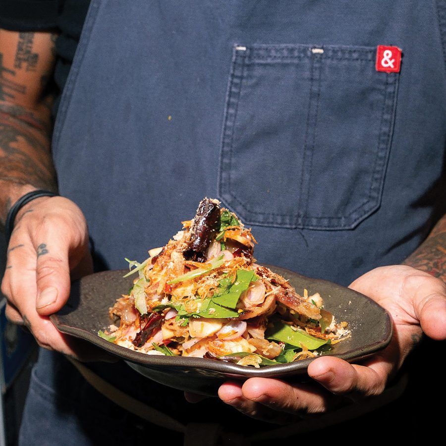 Shot of Haawm’s santol salad being carried out on a plate