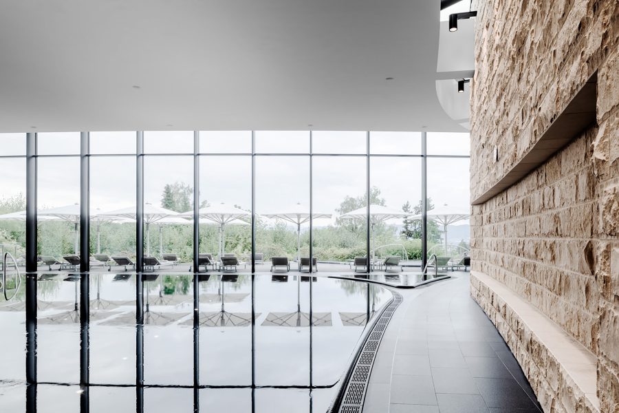 An interior view of the indoor pool at Dolder Grand Interior in Switzerland.