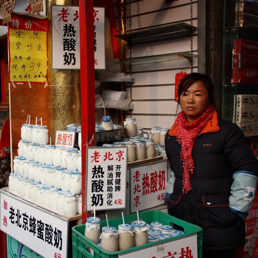 A street food vendor selling traditional Beijing yoghurt at Maxihua Food Shop in Beijing.