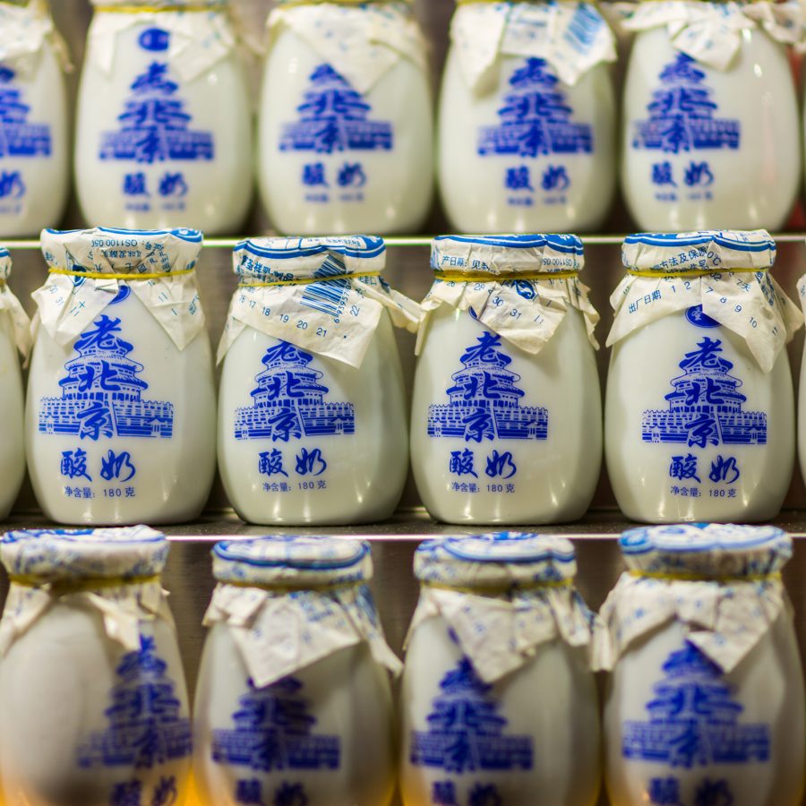A wall of traditional Beijing yoghurt made with fermented milk and honey, found at Maxihua Food Shop.