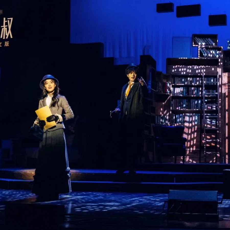 A man and woman performing onstage in Daddy-Long-Legs at Zhuhai Grand Theatre. 
