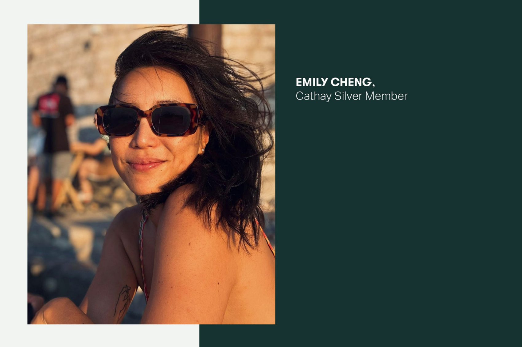 Cathay Silver Member Emily Cheng wearing sunglasses on a beach