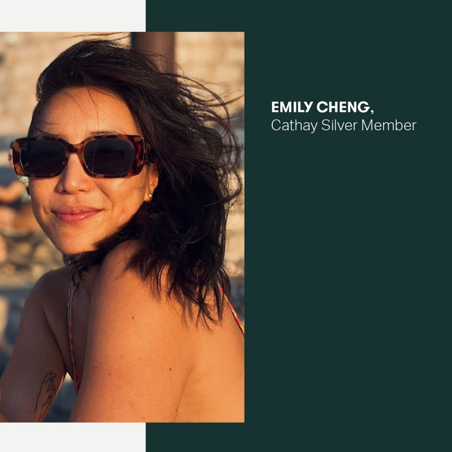 Cathay Silver Member Emily Cheng wearing sunglasses on a beach