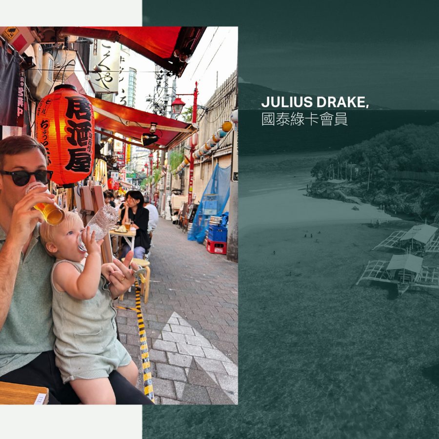 Cathay Green Member Julius Drake on a street in Tokyo drinking a beer with his son