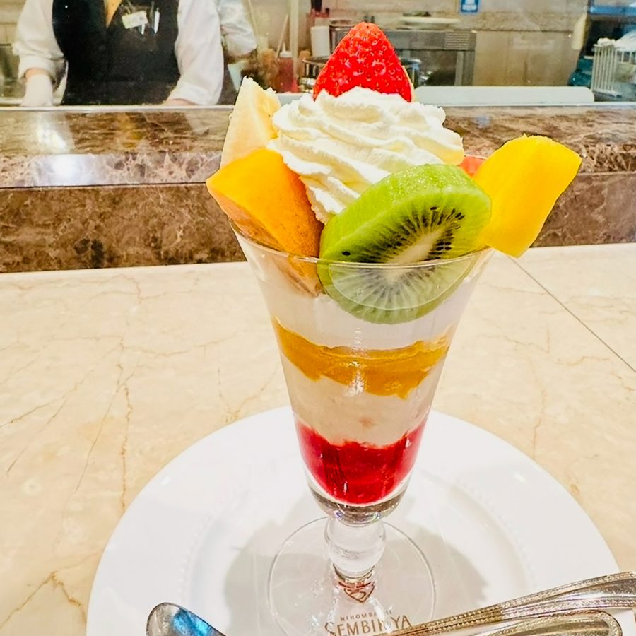 A fruit ice cream sundae in a glass served at Sembikya.