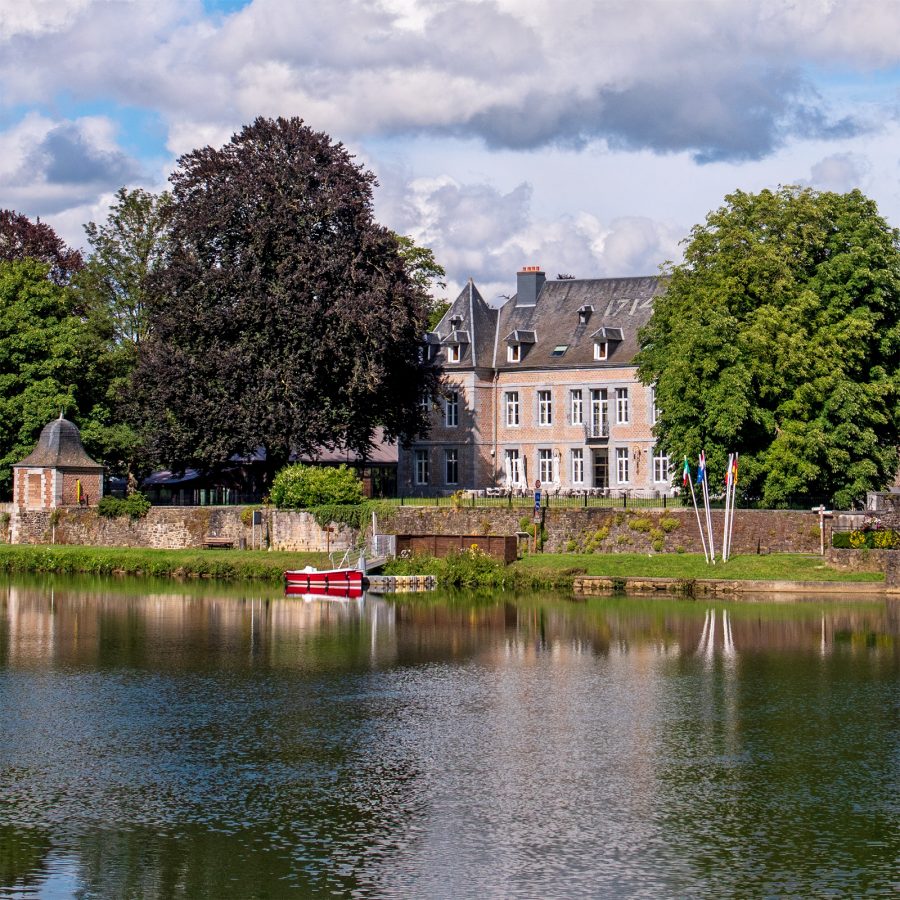 View of Château de Wallerand from across the river in Belgium.