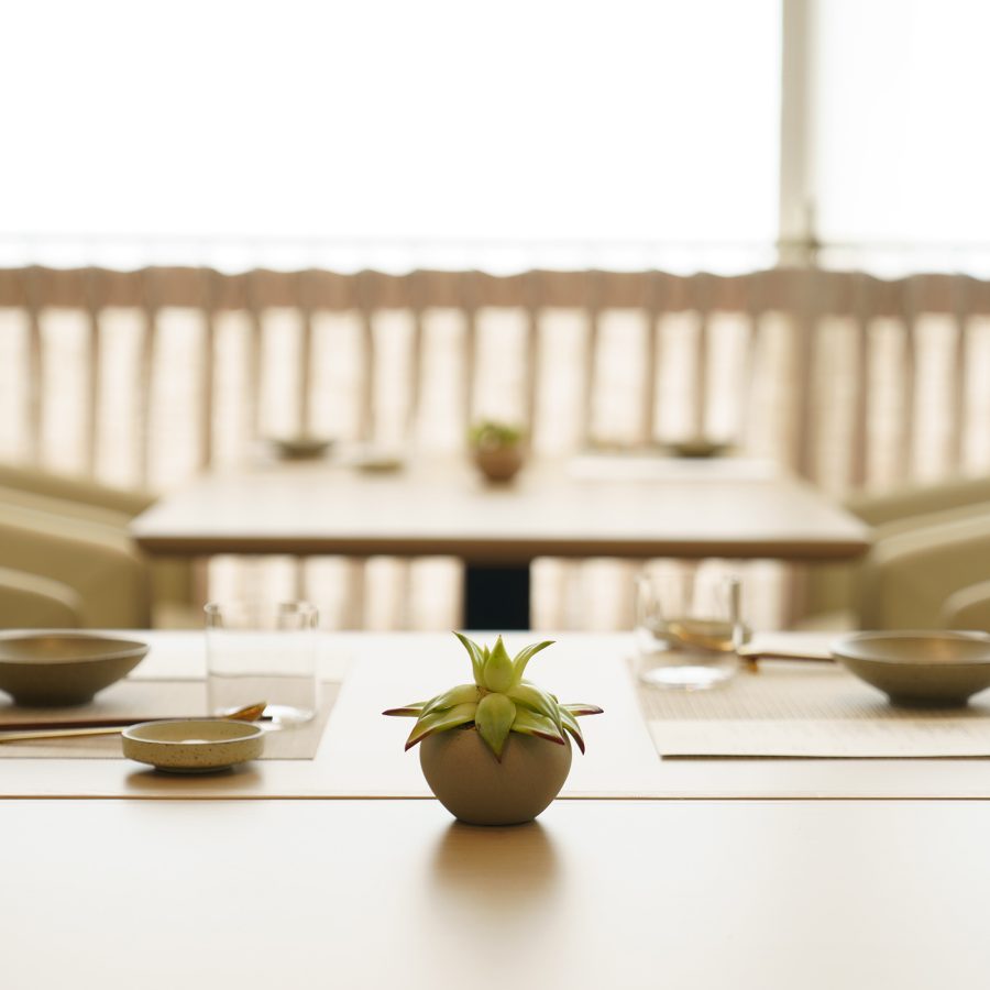 A view of the minimalist interiors and dining tables at Michellin-starred vegetarian restaurant Yuan, Hong Kong.