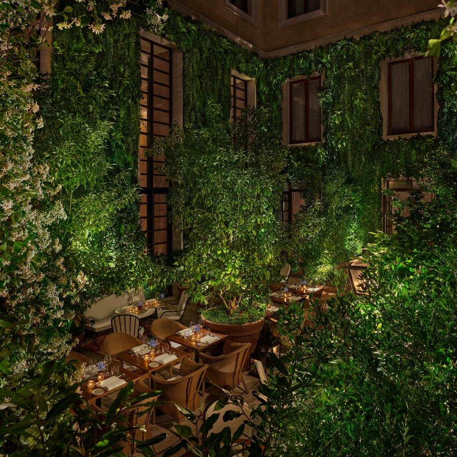 Exterior view of the garden at The Rome Edition. 