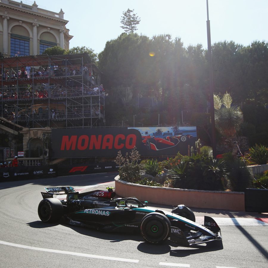 A single-seater racing car drives around the Circuit de Monaco.  
