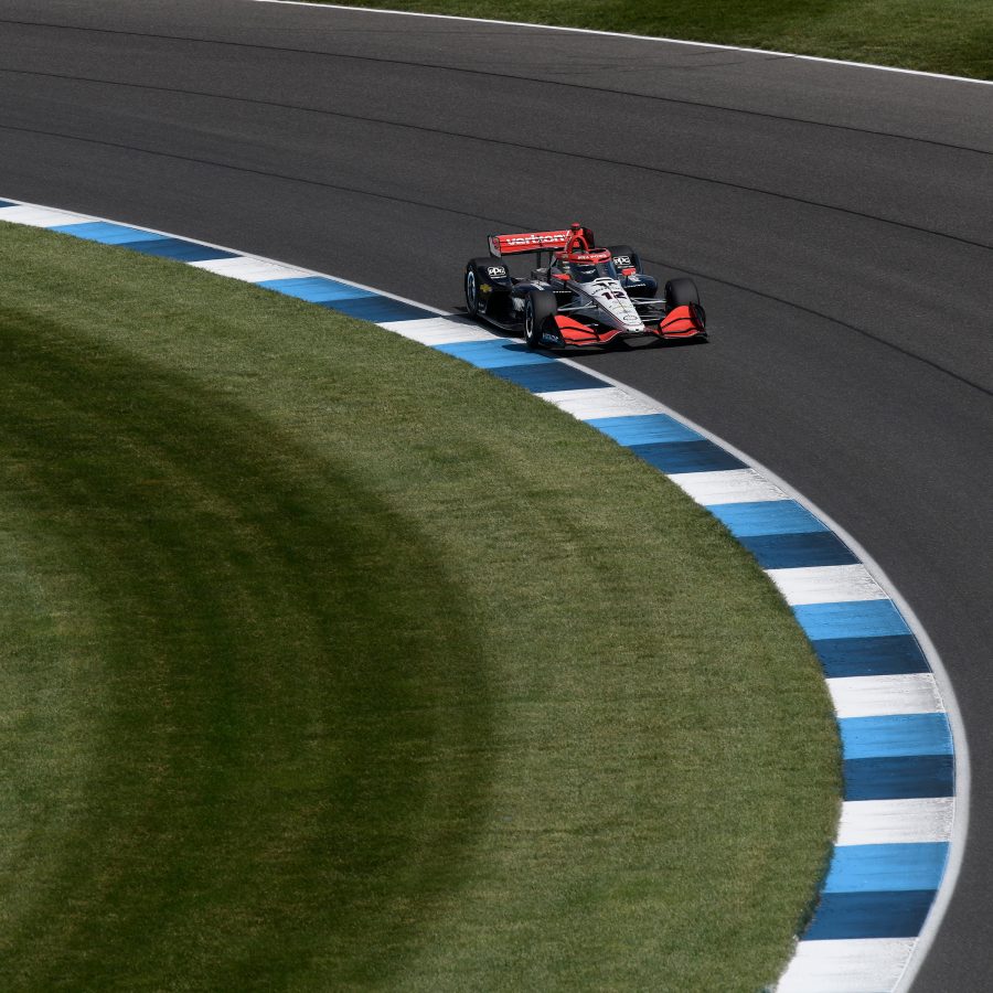 A single-seater car drives along the Indianapolis Motor Speedway in the US.