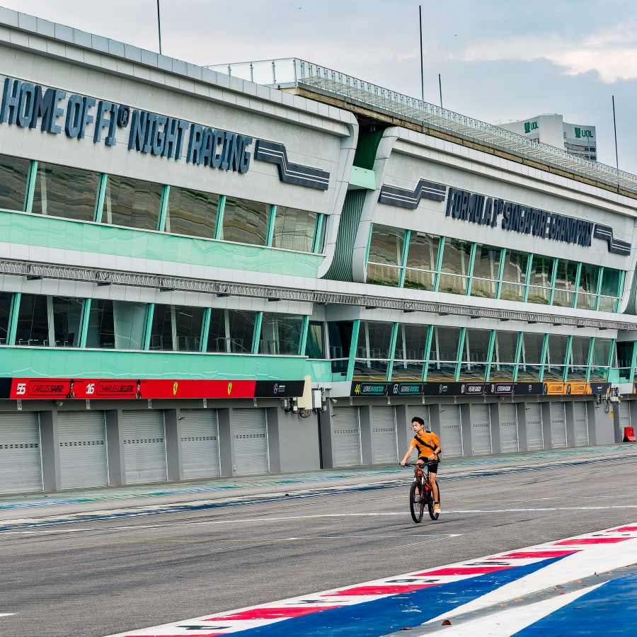 Person cycling along the Marina Bay Street Circuit in Singapore. 