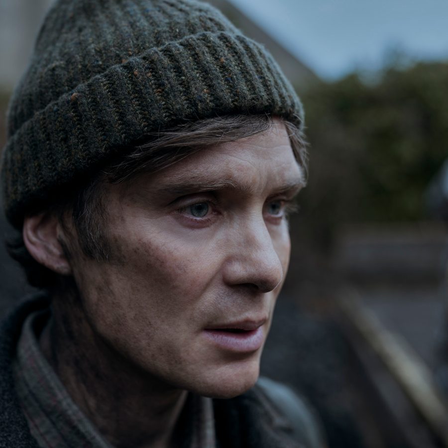 In a scene from Small Things Like These, coal merchant Bill Furlong (played by Cillian Murphy) is shown looking nervous. He is dressed in winter clothes and with charcoal on his face. 