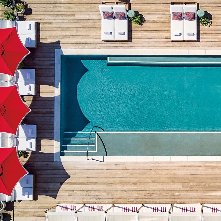 Aerial view of the swimming pool at Virgin Hotels Dallas in the daytime. 