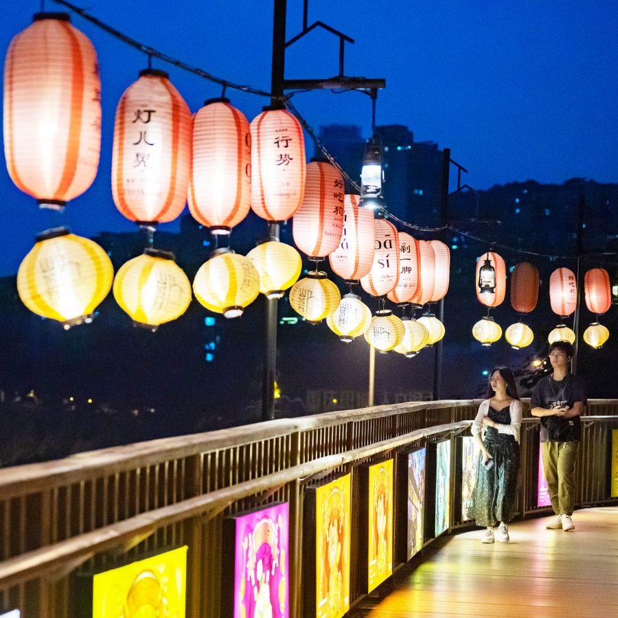 Red and yellow lanterns shine at a viewpoint in Shancheng Lane.