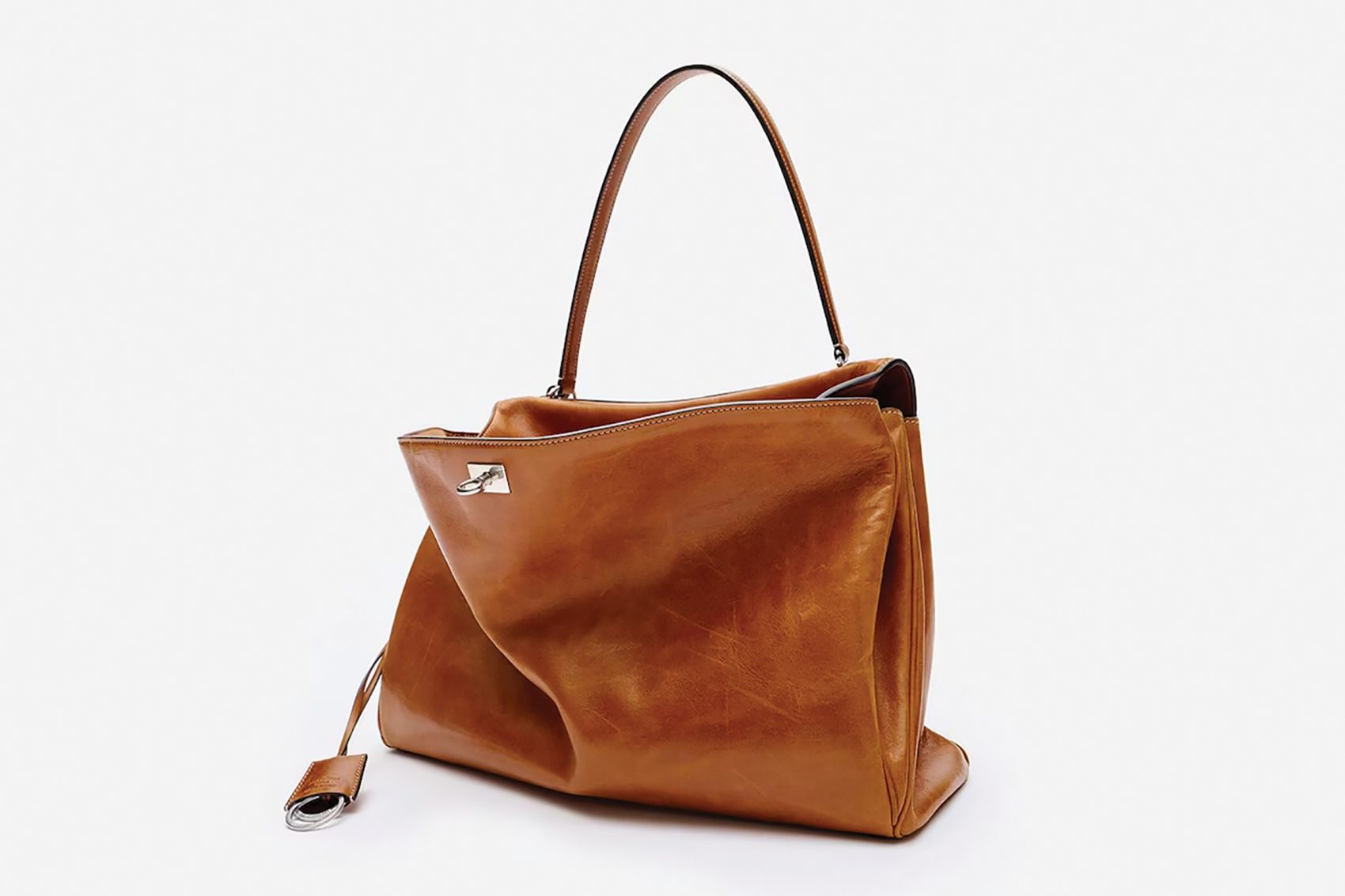 A brown leather handbag sits on display from Balenciaga, which has opened its largest flagship store yet in Riyadh.