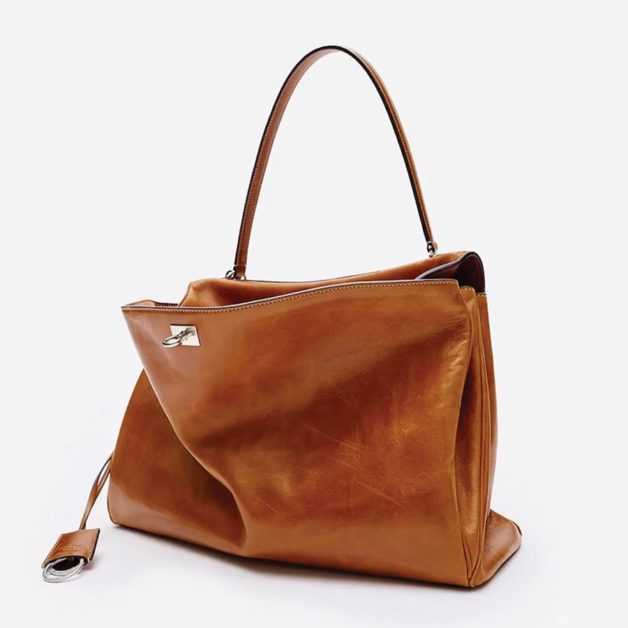 A brown leather handbag sits on display from Balenciaga, which has opened its largest flagship store yet in Riyadh.