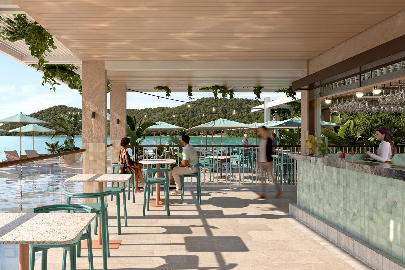 A dining couple sit at a table at an outdoor bar at The Sundays, which will be hosting culinary duo Josh and Julie Niland.
