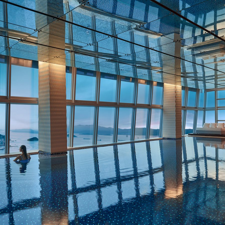 Swimming pool inside the the Ritz-Carlton, Hong Kong, looking outside. 