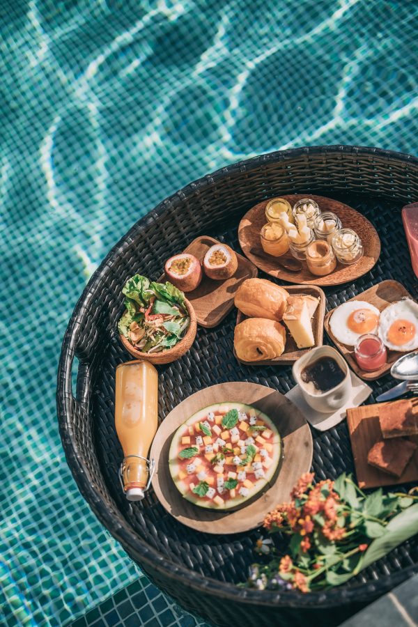 Lots of different food on a floating tray in the pool at Topas Ecolodge, Vietnam. 