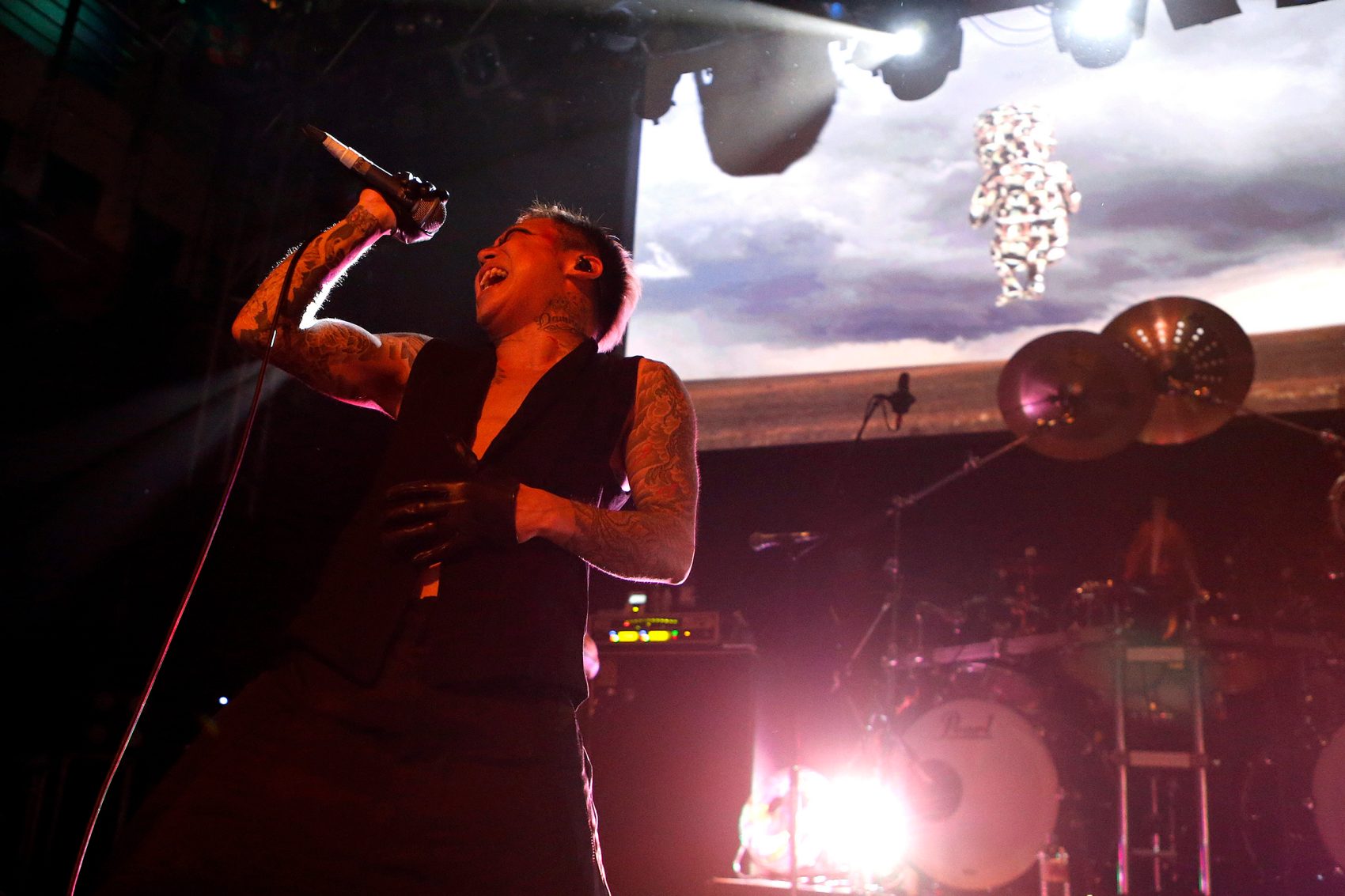 The lead singer of Dir en Grey, touring Asia in 2025, performs onstage.