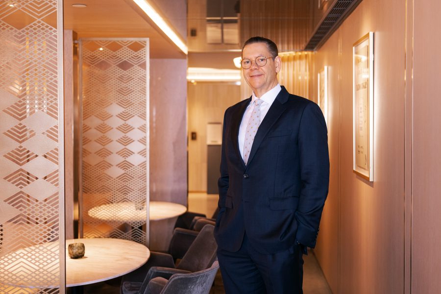 A portrait of Jonathan Bailey, General Manager at The Refinery private member’s club, posing in the lounge area.