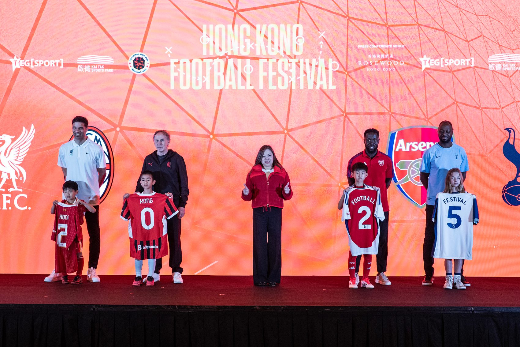 Football players David James, Franco Baresi, Bacary Sagna and Ledley King pose for a group photo with children in football jerseys and Hong Kong Secretary for Culture, Sports and Tourism Rosanna Law Shuk-pui during a press conference on the Hong Kong Football Festival 2025 at Rosewood Hong Kong in Tsim Sha Tsui. 