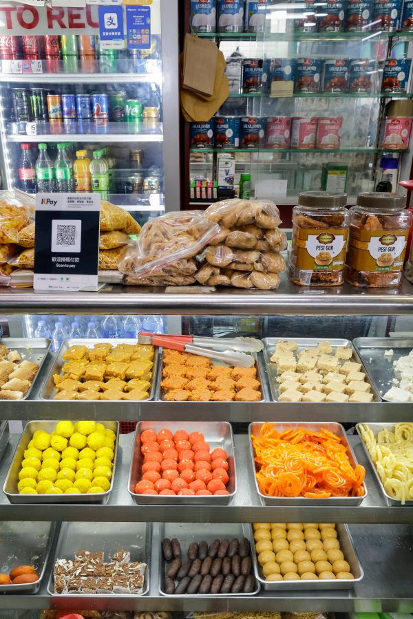 Various Indian sweets on display at a shop inside Chungking Mansions in Tsim Sha Tsui, Hong Kong. 