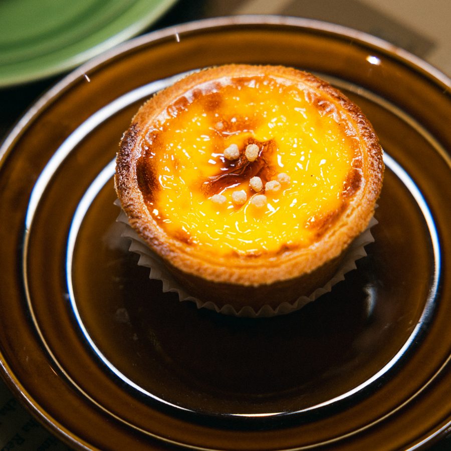 Close up on an egg tart at Tai On Coffee and Tea.