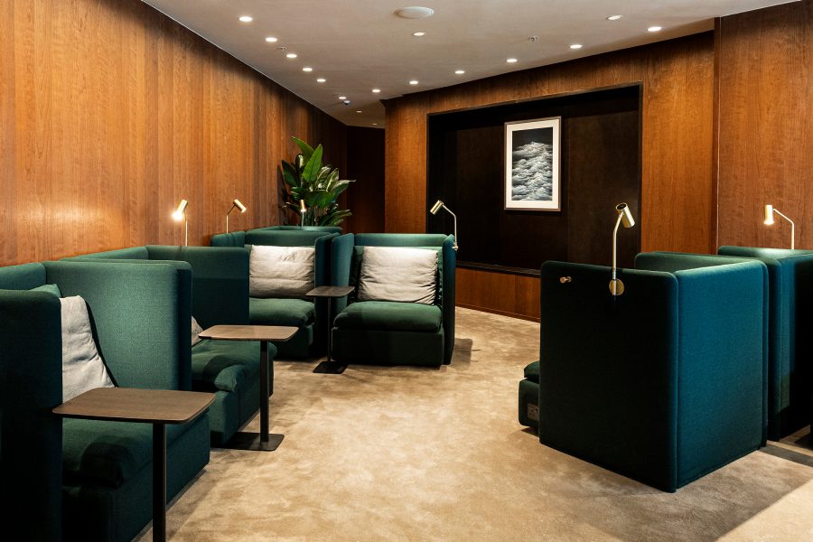 Interior of The Wing, Cathay Pacific business lounge with artwork hanging on the wall.