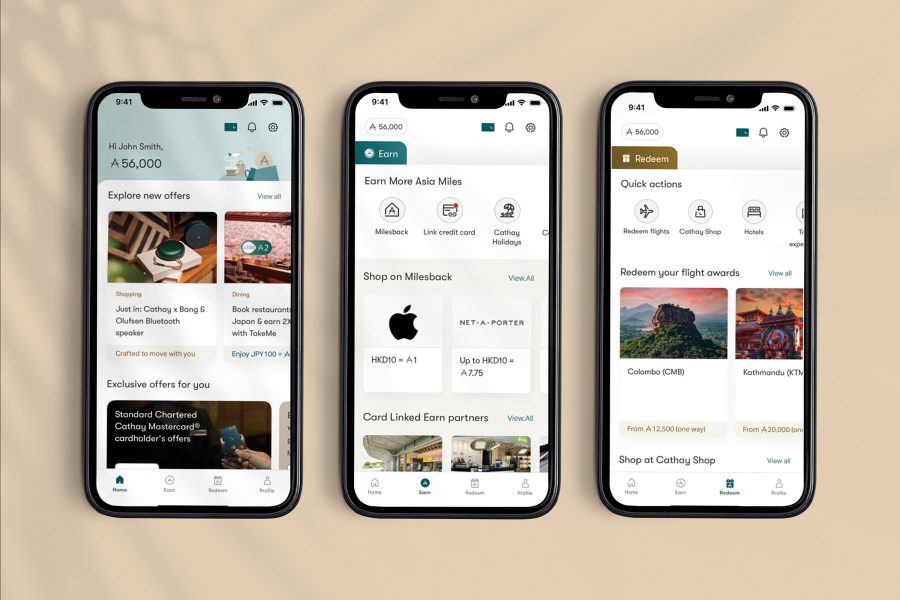 A top-down view of a smartphone on a table displaying the profile page of Asia Miles by Cathay app