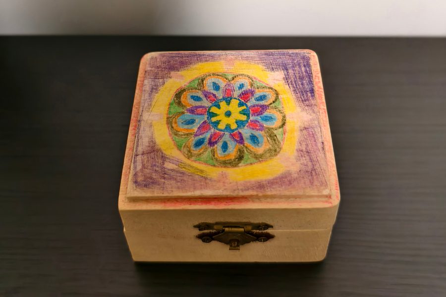 A hand-decorated wooden box given to Peihao Huang by her children.