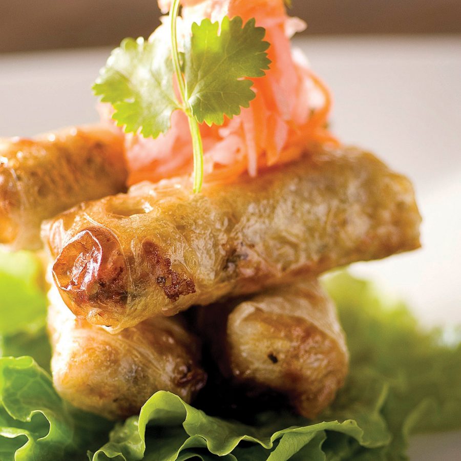 A stack of Vietnamese spring rolls is placed on top of a lettuce leaf. It’s a dish you can order at fusion restaurant Le Soleil.