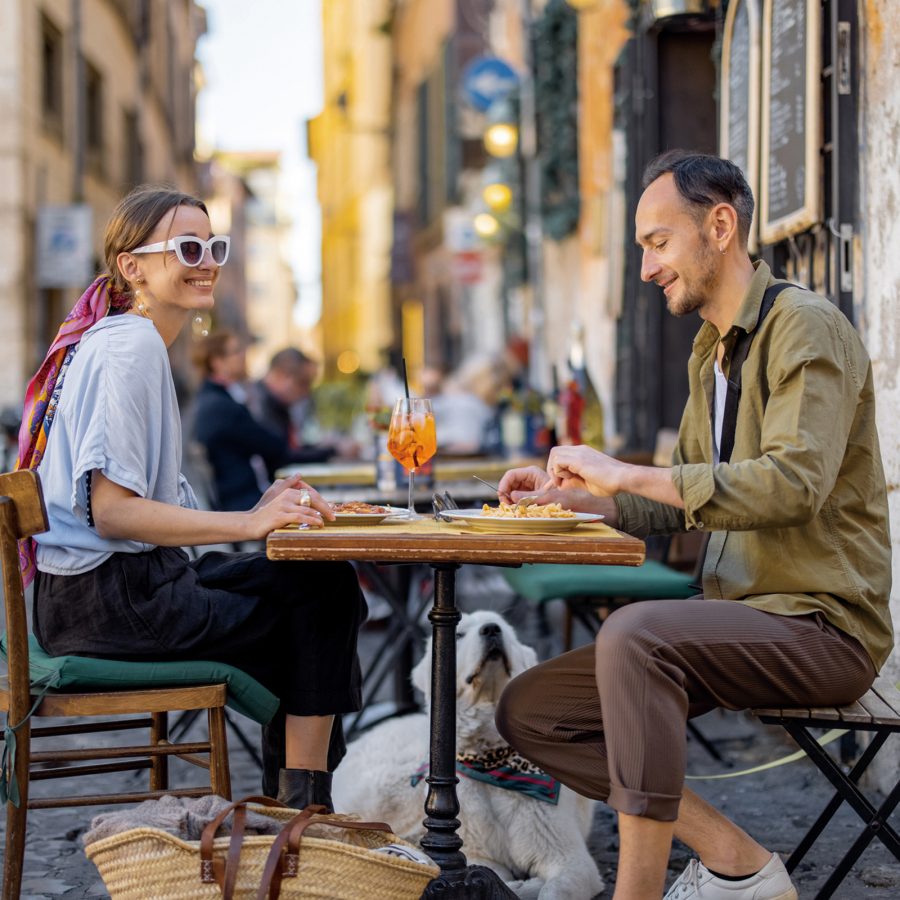 Two diners eat al fresco in Rome. 