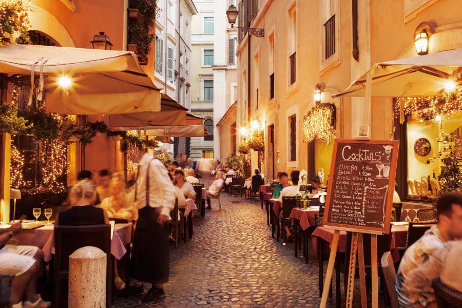  Diners in Rome sit outside for a meal.