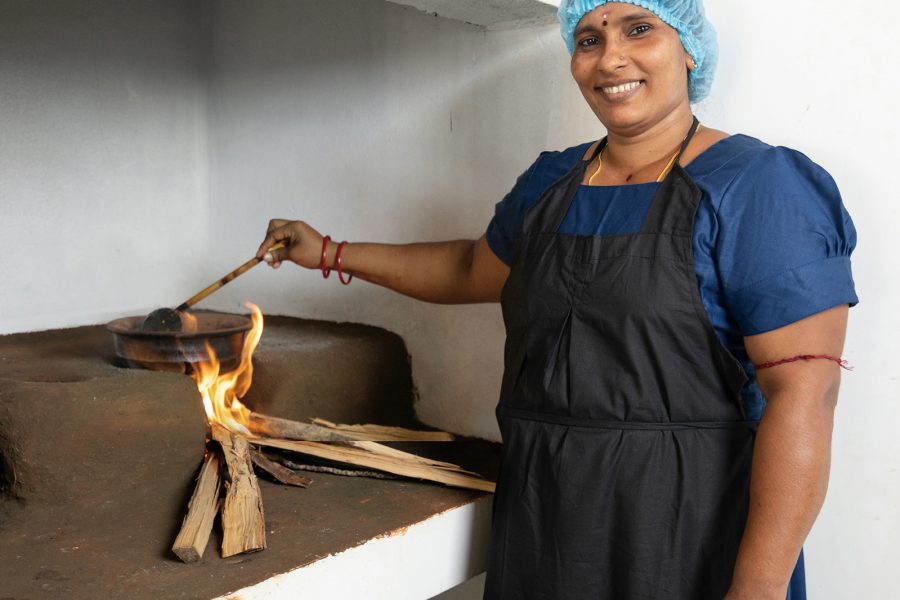 Chef Meg at Jetwing Mahesa Bhawan smiling and cooking