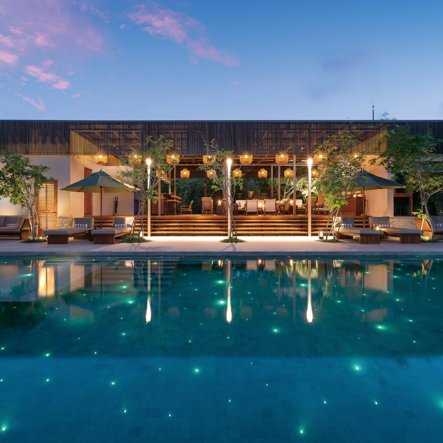 An exterior view of the outdoor pool and hotel at Taru Villas Villu in Jaffna, North Sri Lanka