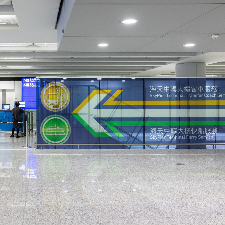 A large arrow points in the direction of where to transfer to the SkyPier Terminal. 