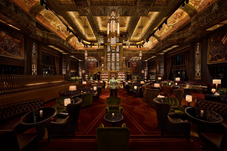 The sophisticated interior design of Atlas bar in Singapore, featuring high ceilings, gilded brass and art deco designs