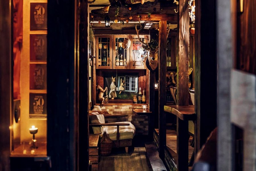 The immersive interiors of Bar BenFiddich in Tokyo, featuring rustic designs, rich details, driftwood decorations and natural elements