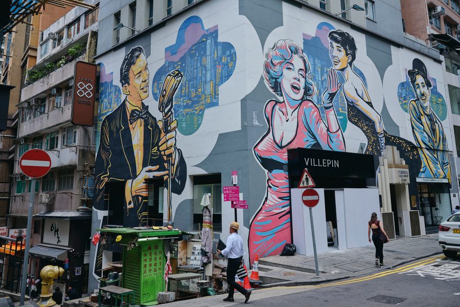 A mural of Frank Sinatra, Marilyn Monroe, Audrey Hepburn and Charlie Chaplin on a building in Hollywood Road, Hong Kong.